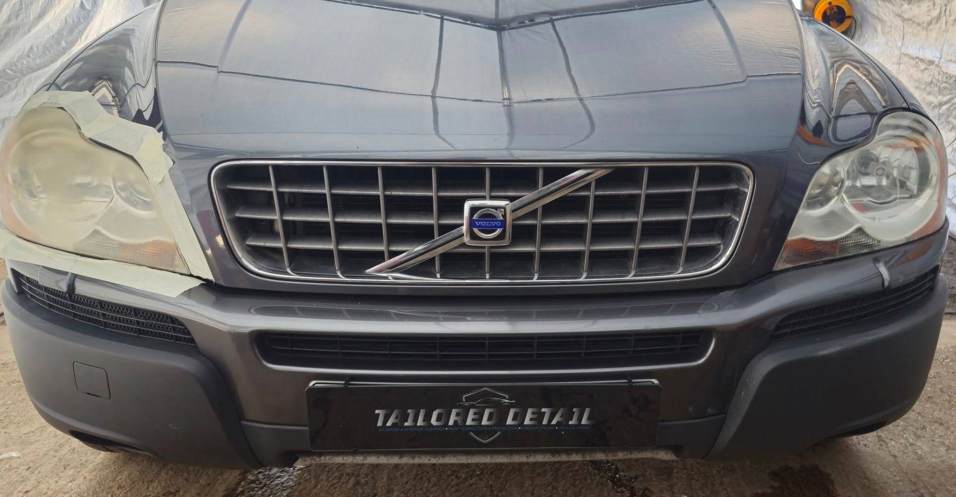 Volvo XC90 headlights masked and prepared for headlight restoration