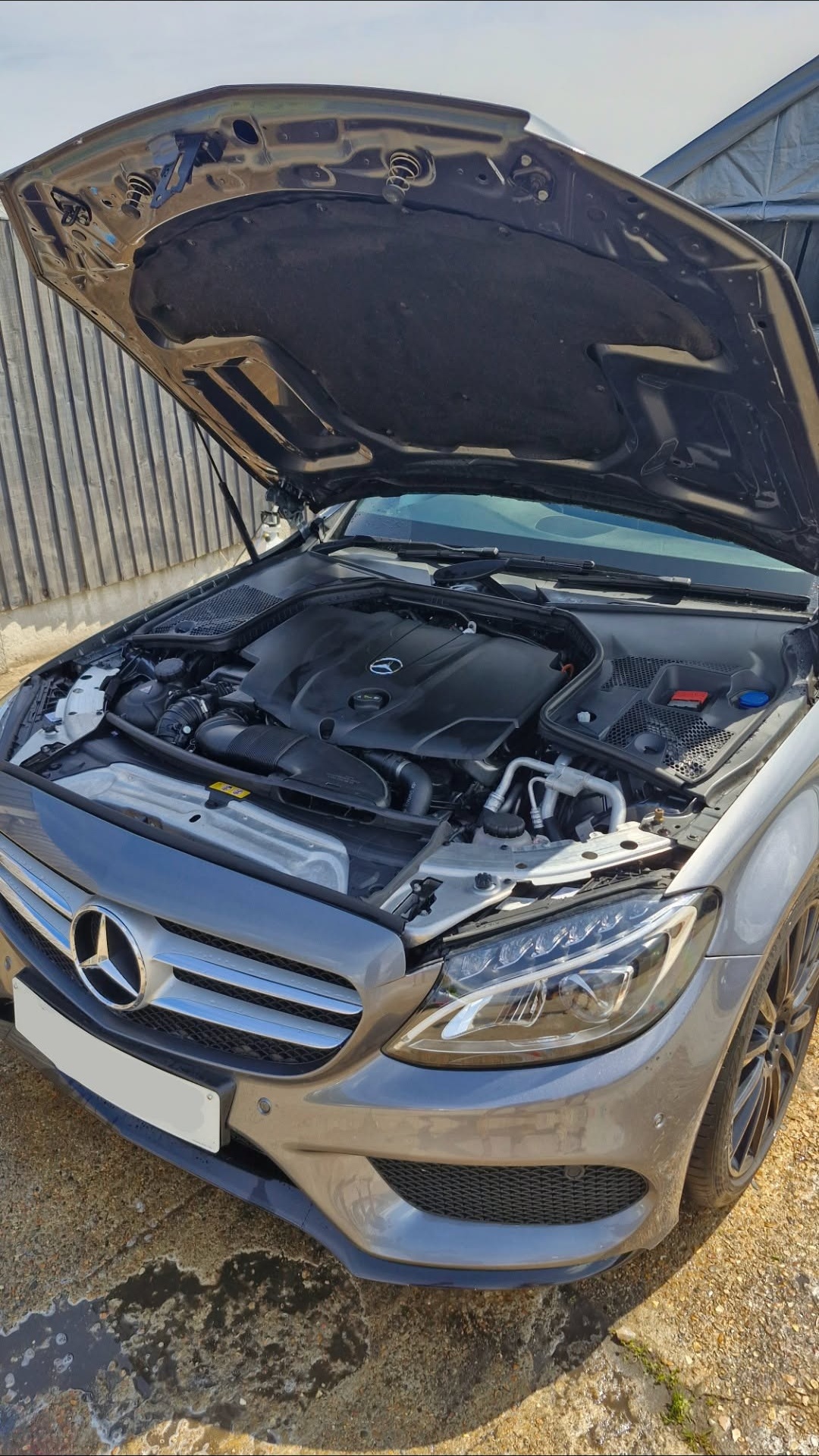 Detailed engine bay of a Mercedes C-Class cleaned by Tailored Detail